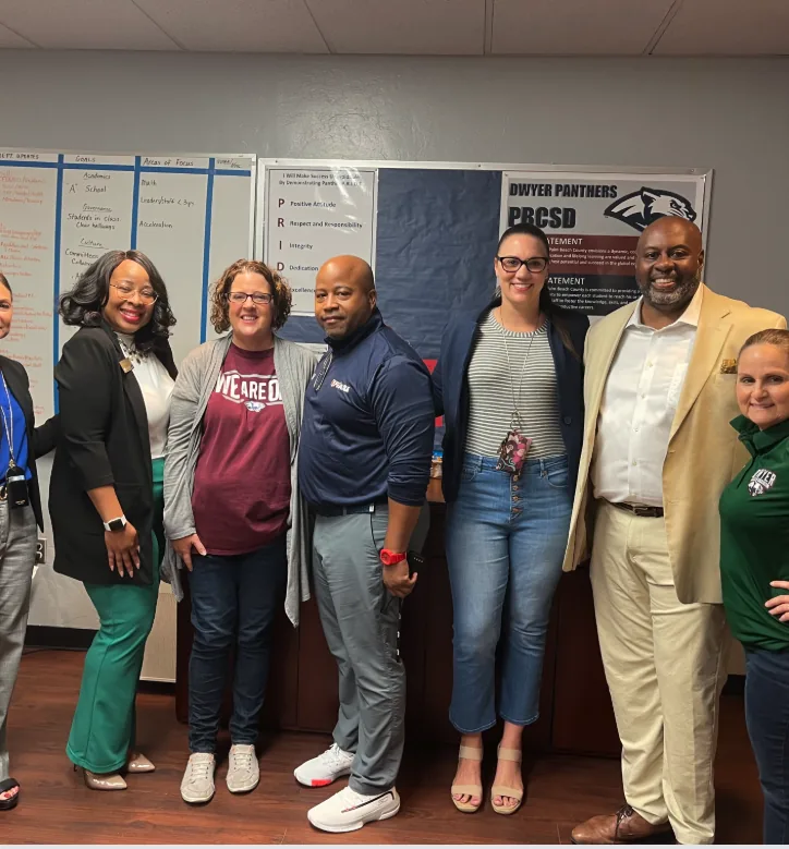 New Elevation Consulting team with school leadership partners